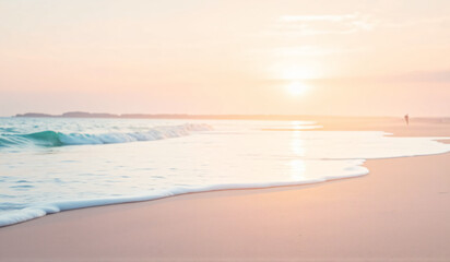 A person walking on a beach at sunset.