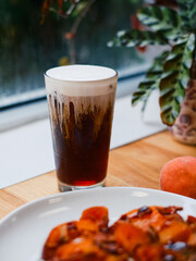 Cold Brew with Sweet Cream Foam by Window