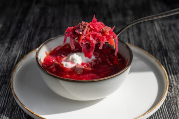 A bowl of borscht soup in a cafe. 