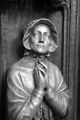 Bronze Sculpture of Woman in Prayer with Rosary in black and white
