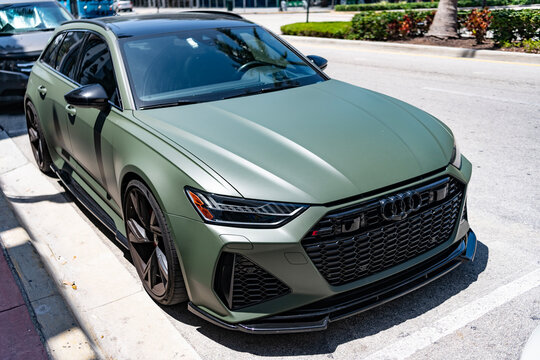 Miami, Florida, USA - April 21, 2025: Luxury car Audi RS6. Car Audi RS6 parked outdoor. Green matte car, front corner view. 2025 Audi RS6 car.