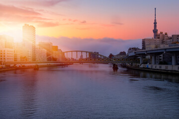 Eidai bridge across the Sumida river at sunset - Tokyo, Japan