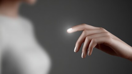 Closeup, woman's hand and pointing finger detailed image of gesture touch