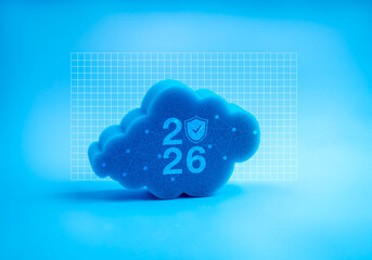 2026 calendar number and safety shield icons on blue cloud storage on grid pattern background....