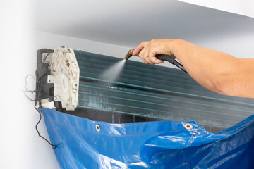 air conditioning cleaning service with water spray