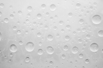 Water drops on white background close up