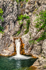 Beautiful landscape with waterfall in the mountain