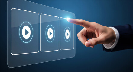 Hand selecting video play button on touch screen interface for media and entertainment concept design