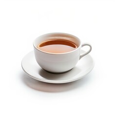 White teacup filled with liquid, on saucer