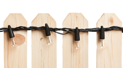 A close-up view of a wooden fence adorned with decorative lights, adding a warm and inviting ambiance to outdoor spaces.