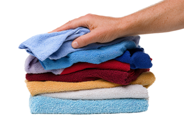 A hand holding a neatly stacked pile of colorful towels, perfect for showcasing home organization and cleaning themes.