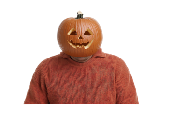 A person playfully wearing a carved pumpkin head, embodying the spirit of Halloween festivities with joy and creativity.