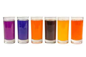 A vibrant display of colorful beverages in shot glasses, showcasing a variety of hues and textures for a festive occasion.