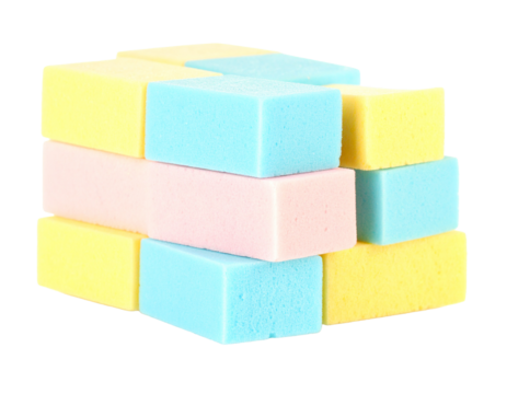 A collection of soft, colorful baby blocks, with different patterns and shapes, isolated on a white background.