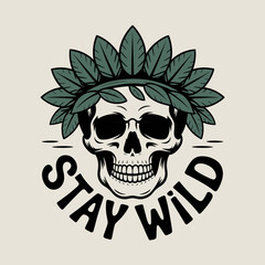 A stylized skull wearing a crown of dark green leaves with the words stay wild in a circular font below symbolizing freedom and nature