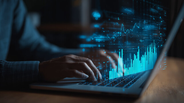 Data analytics and graphs. Analysis of statistical business marketing data. Data scientist using laptop computer to analyze data - Powered by Adobe