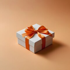 Simple Elegance: A White Gift Box with a Vibrant Orange Ribbon