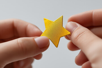 Teacher giving gold star sticker for good work/teachers day
