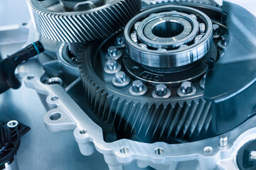 Gear set of driving motor in EV car. Roller bearings. new bearing for electric motor.