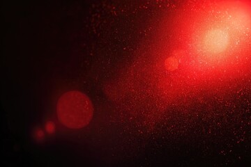 Abstract red light flare on dark background