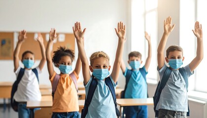 Fototapeta premium Children in a classroom, hands raised