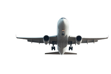 White airplane soaring through clear blue sky with distant clouds above landscape