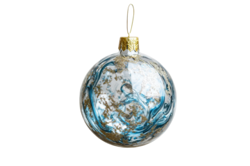 Decorative glass Christmas ball ornament with blue and gold design hanging against a neutral background ready for holiday celebrations