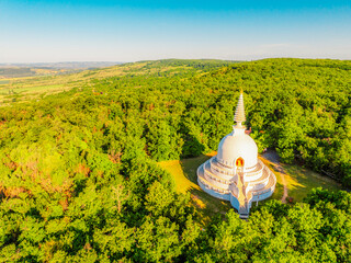 The snow-white Zalaszanto Peace Stupa, a Buddhist building and religious center near Lake Balaton...