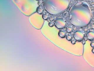 Macro closeup of colorful soap bubbles with iridescent reflections