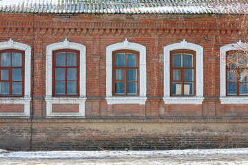 Historic Red Brick Building with Arched Windows