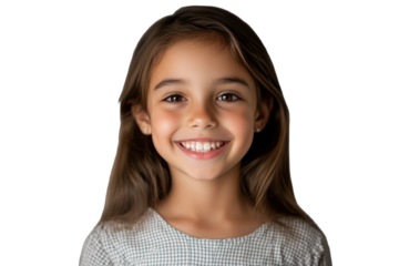 Charming portrait of a joyful little girl with long hair, smiling brightly in a studio setting during a cheerful moment