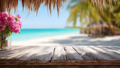Rustic wooden beach table with pink flowers, out-of-focus tropical scene