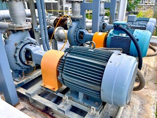 Close-up of electric motors and mechanical components within an industrial machine. The sturdy...