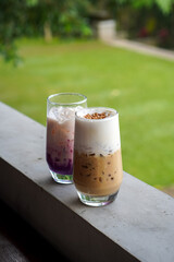 Praline Cookies Coffee, captured on August 12, 2025. Creamy espresso infused with nutty praline flavor, topped with whipped cream and served alongside crunchy cookies in a cozy setting.