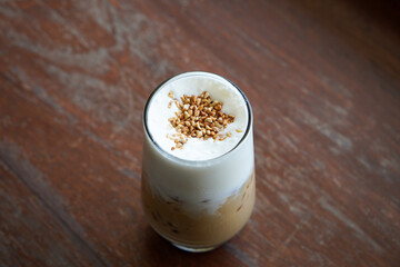 Praline Cookies Coffee, captured on August 12, 2025. Creamy espresso infused with nutty praline flavor, topped with whipped cream and served alongside crunchy cookies in a cozy setting.