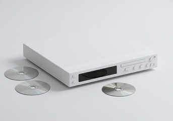 CD player on white background with compact disks minimal design