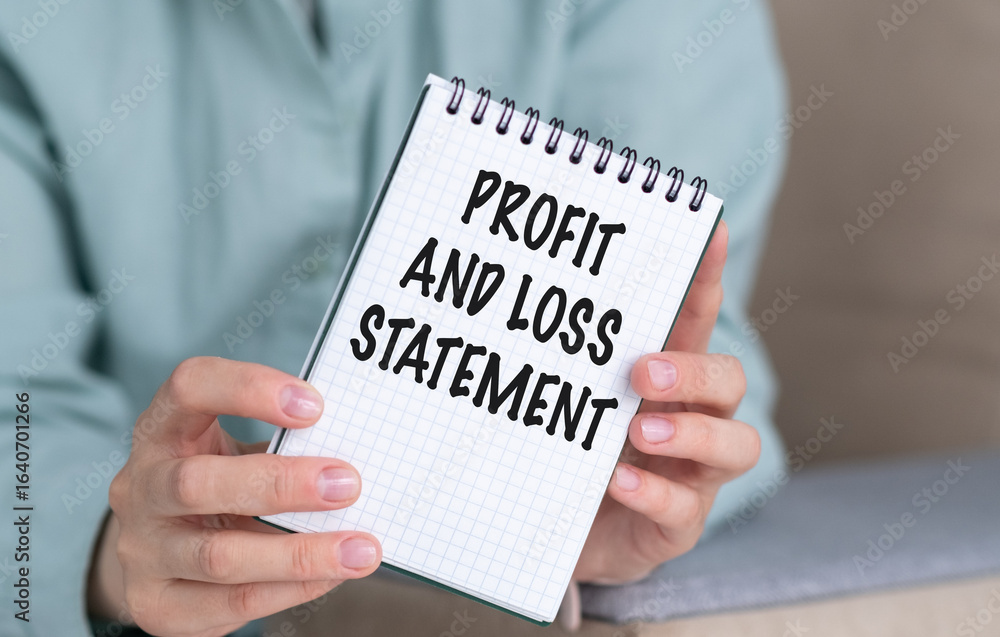 Poster a person is holding a notebook with the words profit and loss statement written on it. the notebook 