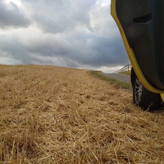combine harvester on wheat field