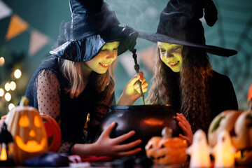 Two girls are celebrating Halloween