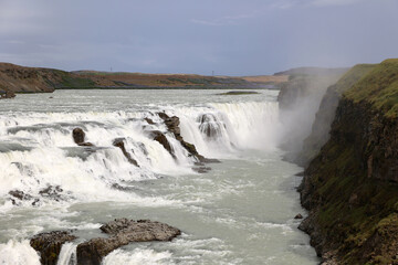 The Gullfoss waterfall is one of the most famous natural attractions in Iceland and is located on the Golden Circle route 