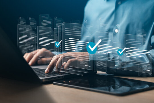 Businessman doing online survey to fill out digital document form for business performance review, document management concept, online document database and digital filing system or software.