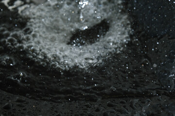 Macro shot of water splashing as background