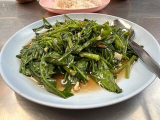 Stir fried morning glory with garlic and chili, Thai food