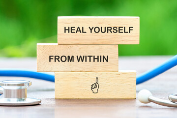 The concept phrase HEAL YOURSELF FROM WITHIN. Heal yourself, mental health, absent-minded, feeling...