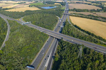 Aerial view of Croft Interchange (Junction 21A) near Birchwood, where the M6 and M62 motorways...