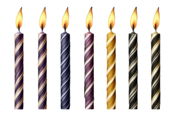 Brightly lit colorful birthday candles with striped designs create a festive atmosphere for celebrating special occasions at evening gatherings
