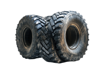 Collection of rugged tires stacked on a clean white background, showcasing tread patterns and robust construction for various vehicles and applications