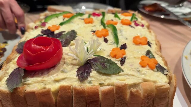 Persian party delights sandwich cak, fresh salad homemade appetizers Garnished plates with roasted eggplant kashke bademjan dip sosis bandari and creamy yogurt toppings Perfect family buffet meal
