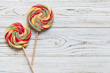 Set of colorful lollipops on colored background. Summer concept. Party Happy Birthday or Minimalist...