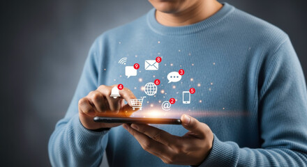 Man using smartphone with floating notification icons for social media and online shopping concept shown